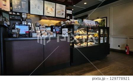 this is food and drink display at cafe  129778921