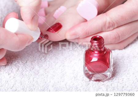 female feet red polished nails female feet red polished nails 129779360