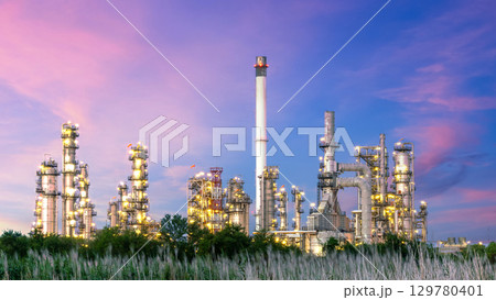 Oil and gas refinery plant at night, Global business energy logistic transportation, Oil and gas refinery petrochemical industrial, Petrochemical refinery industrial energy supply chain. Oil and gas refinery plant at night, Global business energy logistic transportation, Oil and gas refinery petrochemical industrial, Petrochemical refinery industrial energy supply chain. 129780401