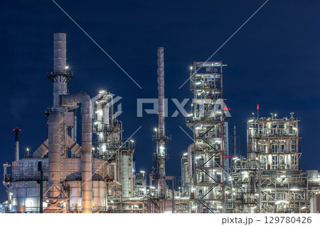 Oil and gas refinery plant at night, Global business energy logistic transportation, Oil and gas refinery petrochemical industrial, Petrochemical refinery industrial energy supply chain. 129780426