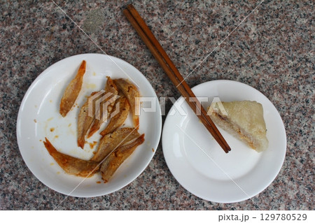 dried fish in basket and plate dried fish in basket and plate 129780529