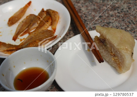 dried fish in basket and plate dried fish in basket and plate 129780537