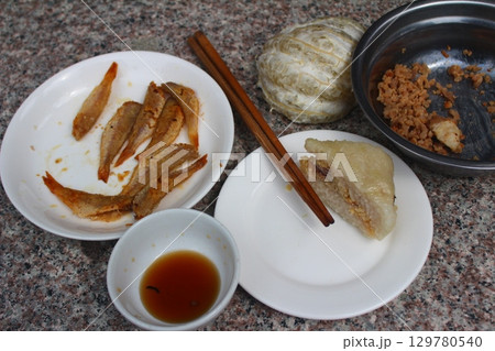 dried fish in basket and plate dried fish in basket and plate 129780540
