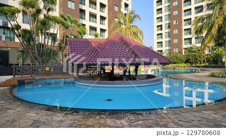 swimming pool with stair at hotel 129780608
