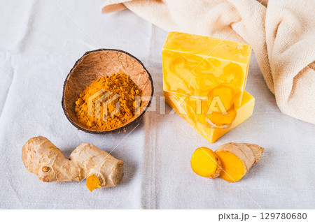 Organic Moisturizing Turmeric Soap Bars on Table 129780680