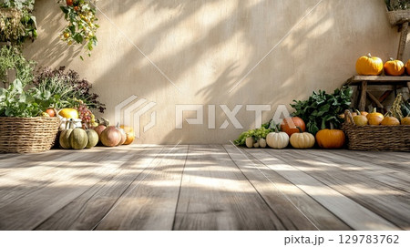 Fall market stall with pumpkins and seasonal produce, warm sunlight, space for text. . 129783762