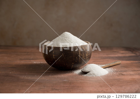Sweetener powder in a bowl. Sugar alternative, food and nutrition 129786222