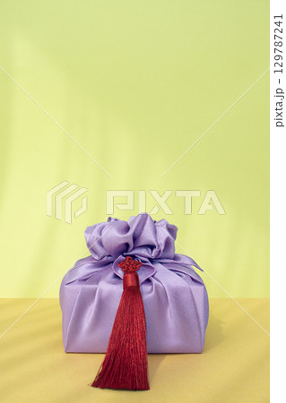 Korean holiday gift wrapping with bojagi (wrapping cloth), Chuseok and Hangawi gifts and copyspace 129787241