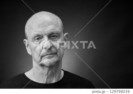 Monochrome Portrait of a senior man in a vintage Harcourt style lighting Monochrome Portrait of a senior man in a vintage Harcourt style lighting 129789239