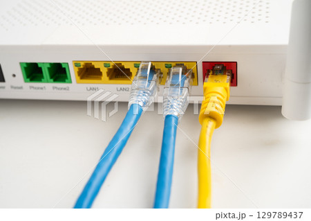 Ethernet cable with wireless router connect to internet service provider network. Ethernet cable with wireless router connect to internet service provider network. 129789437