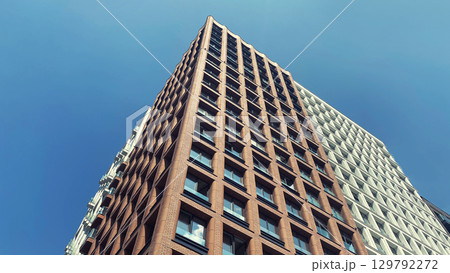 Architecture and real estate, modern residential apartment building with large panoramic windows 129792272