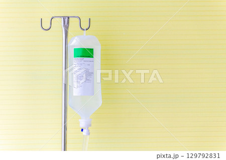 Saline solution fluid iv bag in emergency room at hospital. 129792831