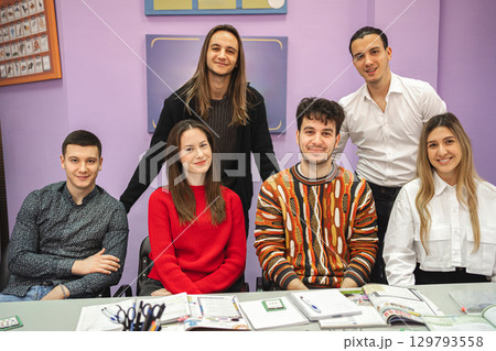 Group of happy students at language school class 129793558
