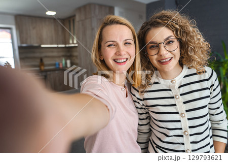 Two Women Taking a Selfie Two Women Taking a Selfie 129793621
