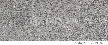 Rough concrete wall texture creating interesting visual effect Rough concrete wall texture creating interesting visual effect 129794825