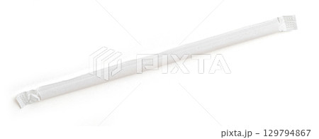 Wrapped paper drinking straw isolated on white background 129794867