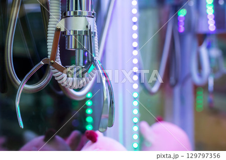 Claw Machine with Colorful LED Lights and Plush Toys Claw Machine with Colorful LED Lights and Plush Toys 129797356