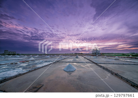 Sunset Light and Moving Clouds Over Salt Fields in Qigu, Tainan City, Taiwan. 129797661