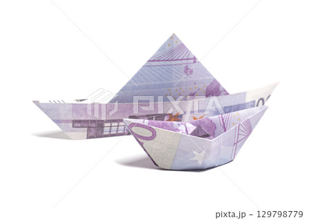Money Origami boat with Euro bills Money Origami boat with Euro bills 129798779