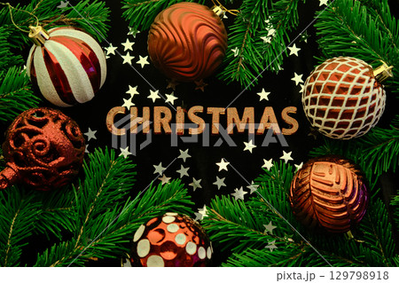 Dark Christmas background with the words CHRISTMAS. Dark Christmas background with the words CHRISTMAS. 129798918