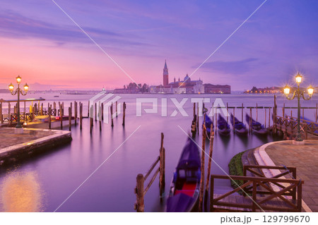 San Giorgio Maggiore and gondolas at sunrise in Venice Italy 129799670