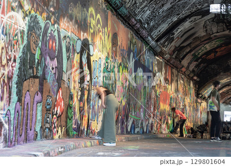 Leake Street Arches also known as the Banksy Tunnel, is a vibrant urban space known for its legal graffiti tunnel. 129801604