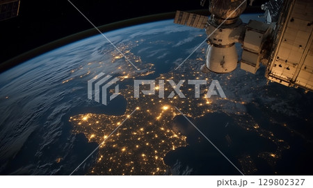 Vibrant night view of Europe showcasing urban areas and landscapes from space 129802327