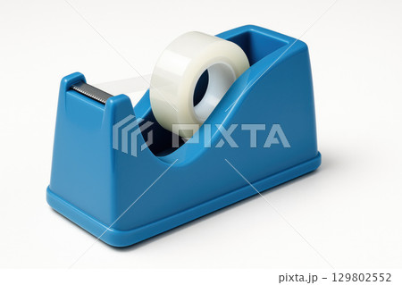 Blue plastic tape dispenser holding transparent adhesive roll isolated white background office supply concept with clean design and smooth surface 129802552