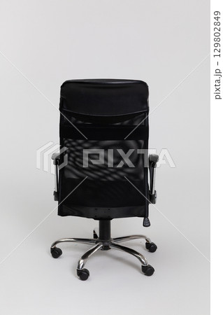 A stylish Ergonomic Black Office Chair on Wheels designed for maximum comfort and productivity 129802849