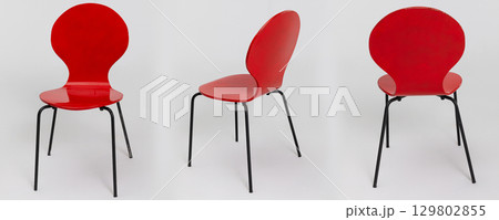 A Stunning and Vibrant Red Chair Featuring a Chic and Stylish Contemporary Design 129802855