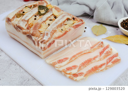 Raw pork fat with garlic. Salo. lard. 129803520