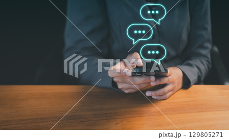 Young woman using a smartphone with technology smart robot AI chatbot for chat. Digital chatbot are assistant conversation for provide access to data growth of business in online network. 129805271