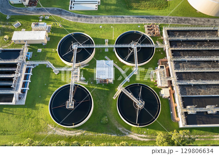 Water treatment facility is essential infrastructure to clean and process water, removing pollutants before distributing it to homes and businesses Water treatment facility is essential infrastructure to clean and process water, removing pollutants before distributing it to homes and businesses 129806634