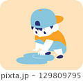 水たまりで遊ぶ男の子のイラスト 129809795
