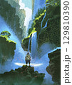 Explorer Standing Before Digital Waterfalls 129810390