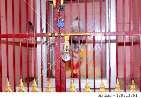 Locked Temple Gate with Idol Inside Locked Temple Gate with Idol Inside 129813861