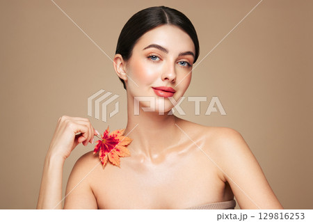 Autumn portrait of beautiful woman with clean fresh skin Autumn portrait of beautiful woman with clean fresh skin 129816253