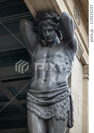 Close-up of the granite Atlantean statue at the New Hermitage in Saint Petersburg, Russia Close-up of the granite Atlantean statue at the New Hermitage in Saint Petersburg, Russia 129816287