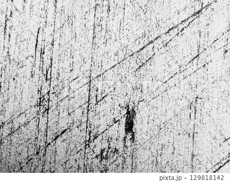 Surfaces showing intricate textures and scratches from use and wear in a detailed close-up view captured in monochrome 129818142