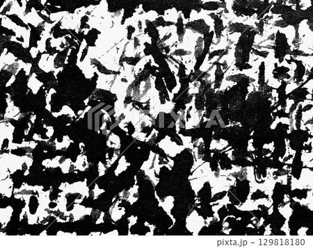 Abstract black and white patterns created using brush strokes on canvas showcasing bold artistic expression 129818180