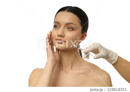 Model receives cosmetic filler treatment, isolated on white, PNG Model receives cosmetic filler treatment, isolated on white, PNG 129818351