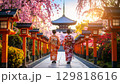 桜の満開の京都風な風景を歩く芸者 129818616