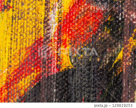 Vibrant abstract artwork with bold colors showcasing dynamic brush strokes and depth at an urban art exhibit 129819253