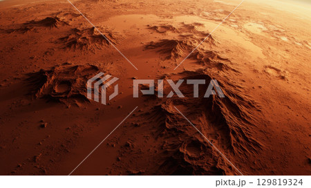 The Martian surface displays an expanse of rugged terrain with multiple craters, highlighted by a dramatic sunset that casts warm tones across the landscape 129819324