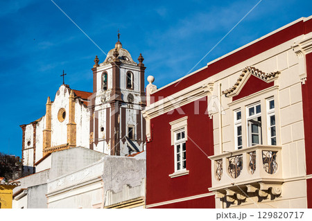 View of modern and historic buildings in the center of Silves, Algarve region, Portugal. View of modern and historic buildings in the center of Silves, Algarve region, Portugal. 129820717