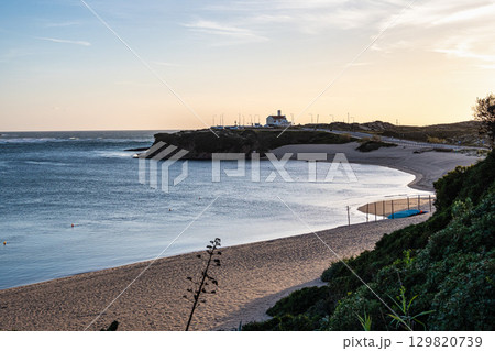 Praia do Farol in Vila Nova de Milfontes, Portugal is located at the mouth of the Mira River on the northern bank. 129820739
