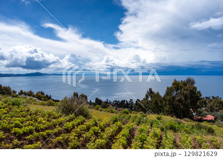 Village on Amantani Island overlooking Lake Titicaca, Peru 129821629