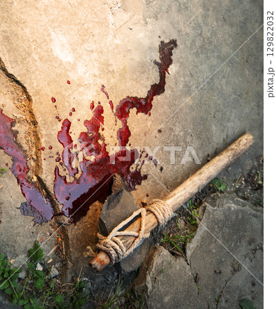 Stone axe with red blood Stone axe with red blood 129822032