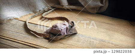 Old sling with a stone Old sling with a stone 129822038