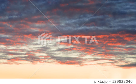 Bright clouds in the evening sky 129822040